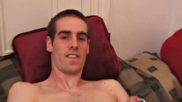 There's some good porn playing on the TV, so James Shafer decides to jack off. He pulls out his pierced dick and strokes it with determination, until he blows his warm cum load.