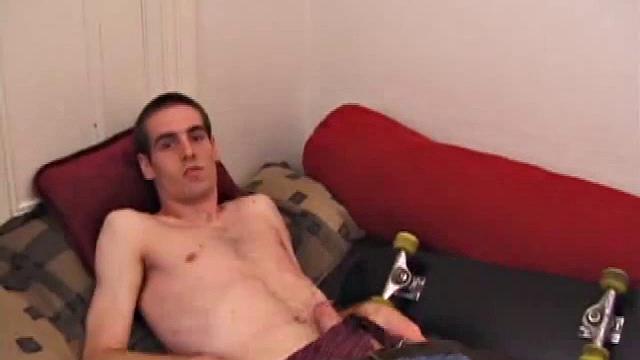 There's some good porn playing on the TV, so James Shafer decides to jack off. He pulls out his pierced dick and strokes it with determination, until he blows his warm cum load.