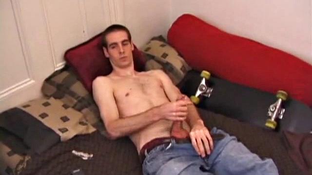 There's some good porn playing on the TV, so James Shafer decides to jack off. He pulls out his pierced dick and strokes it with determination, until he blows his warm cum load.