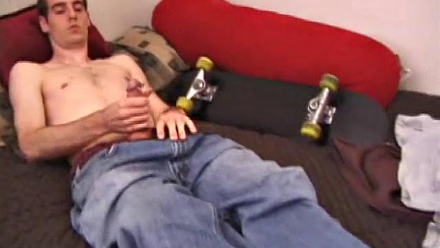 There's some good porn playing on the TV, so James Shafer decides to jack off. He pulls out his pierced dick and strokes it with determination, until he blows his warm cum load.