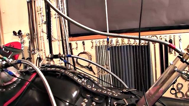 CFNM femdom MILF in latex teases bound sub with cock pump