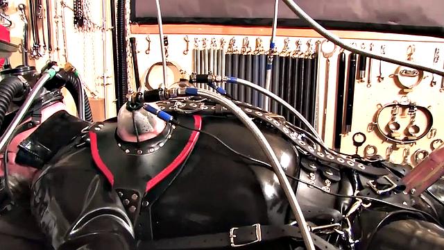 CFNM femdom MILF in latex teases bound sub with cock pump