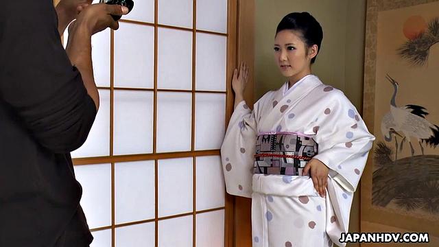Yui Watanabe is interviewed by a man today in her kimono