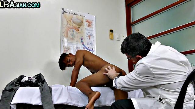 Skinny Asian guy fucked by doctor's cock in infirmary