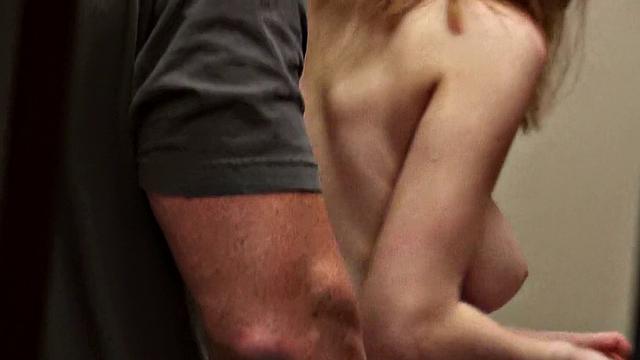 Get a POV view of a brown-haired babe getting her nipples sucked in a store