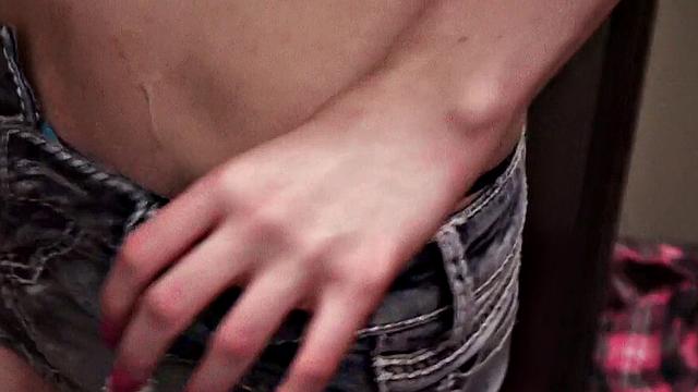 Get a POV view of a brown-haired babe getting her nipples sucked in a store