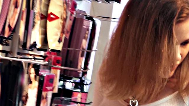 Get a POV view of a brown-haired babe getting her nipples sucked in a store