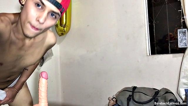 Our featured solo boy of the week is sexy young Zalar, a cute Latino with a beautiful body. After sucking on a dildo, this adorable guy starts stripping and working on a boner.