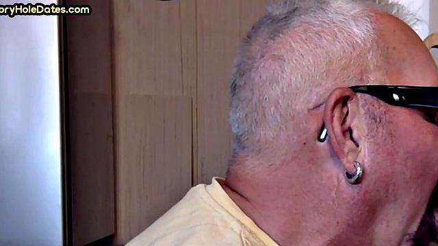 Gay Daddy adores sucking gloryhole penis at his home