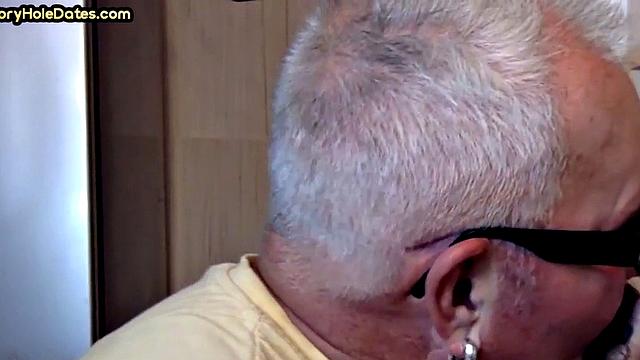Gay Daddy adores sucking gloryhole penis at his home