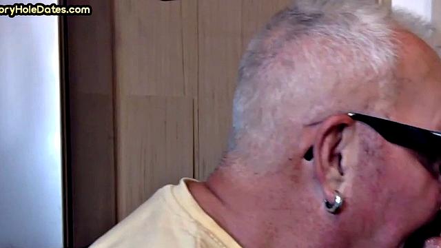 Gay Daddy adores sucking gloryhole penis at his home