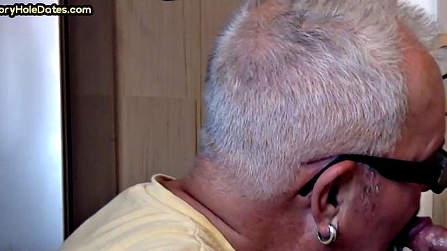 Gay Daddy adores sucking gloryhole penis at his home