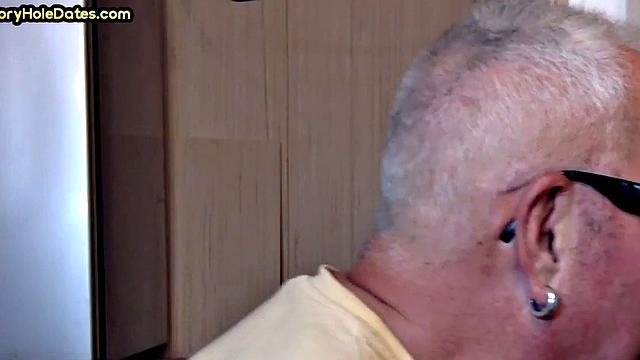 Gay Daddy adores sucking gloryhole penis at his home