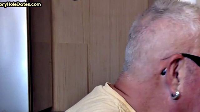 Gay Daddy adores sucking gloryhole penis at his home
