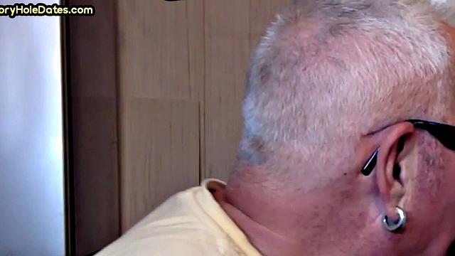 Gay Daddy adores sucking gloryhole penis at his home