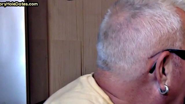 Gay Daddy adores sucking gloryhole penis at his home