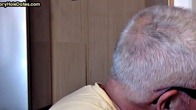Gay Daddy adores sucking gloryhole penis at his home