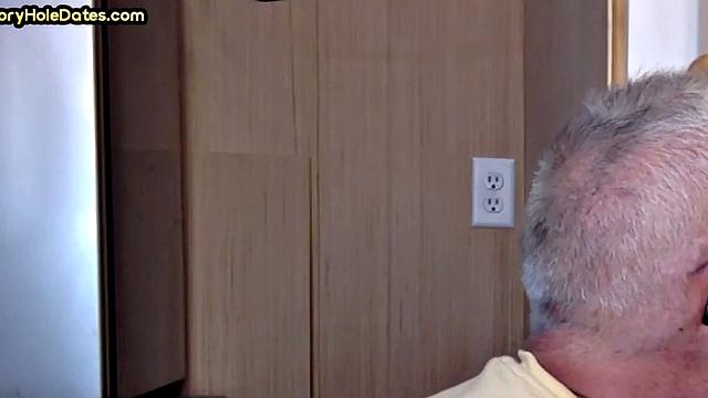 Gay Daddy adores sucking gloryhole penis at his home