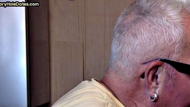 Gay Daddy adores sucking gloryhole penis at his home