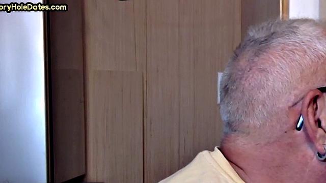 Gay Daddy adores sucking gloryhole penis at his home