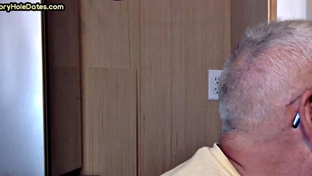 Gay Daddy adores sucking gloryhole penis at his home
