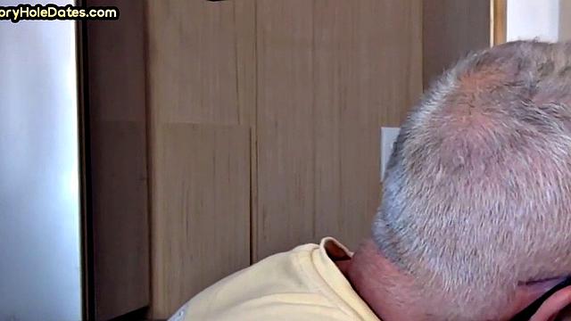 Gay Daddy adores sucking gloryhole penis at his home
