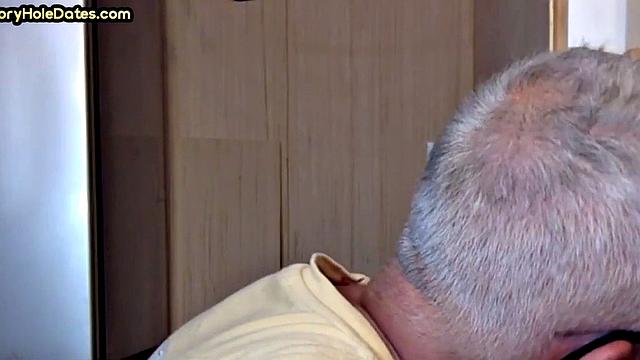 Gay Daddy adores sucking gloryhole penis at his home