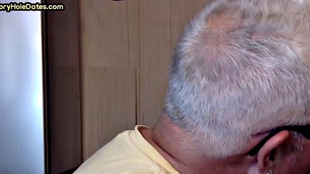 Gay Daddy adores sucking gloryhole penis at his home