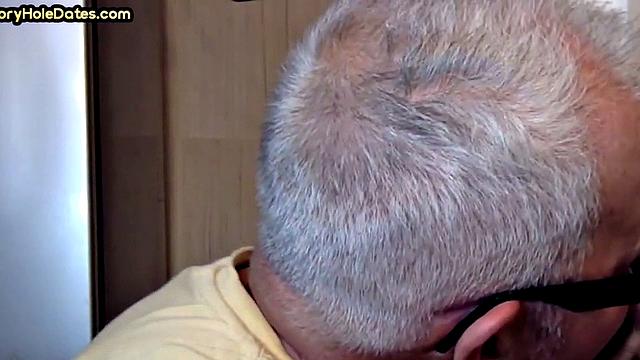 Gay Daddy adores sucking gloryhole penis at his home