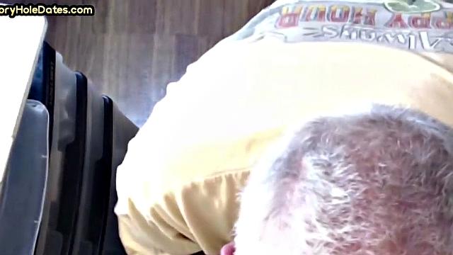 Gay Daddy adores sucking gloryhole penis at his home