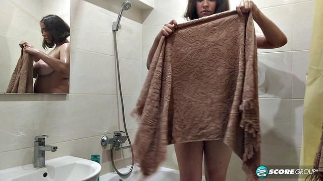 A very busty teen with hairy pussy