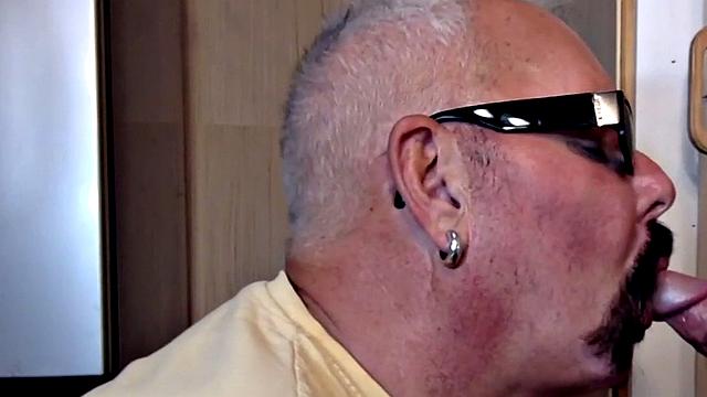 Gloryhole gaydaddy blows cock in closeup at home