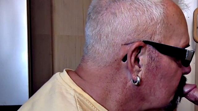 Gloryhole gaydaddy blows cock in closeup at home