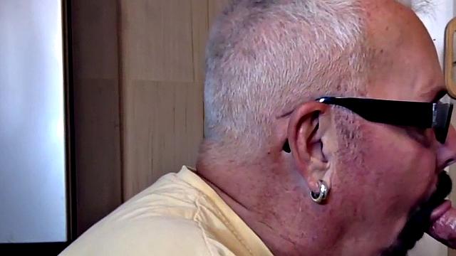 Gloryhole gaydaddy blows cock in closeup at home
