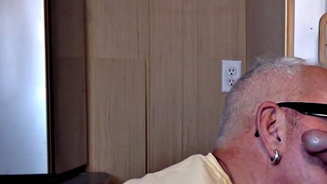 Gloryhole gaydaddy blows cock in closeup at home