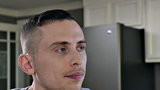 Watch this tattooed black officer give a sloppy rimjob before breeding his ass in the kitchen