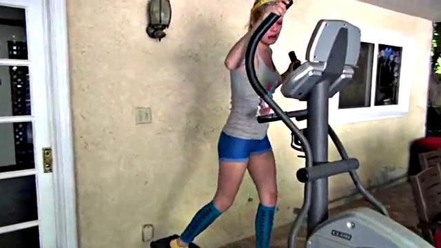 Cute blonde teen plays with her pussy solo