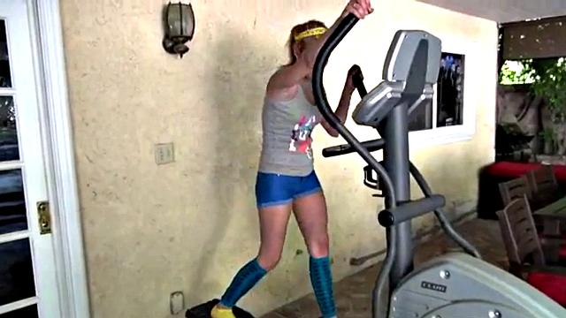 Cute blonde teen plays with her pussy solo