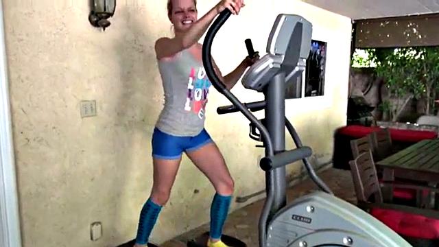 Cute blonde teen plays with her pussy solo