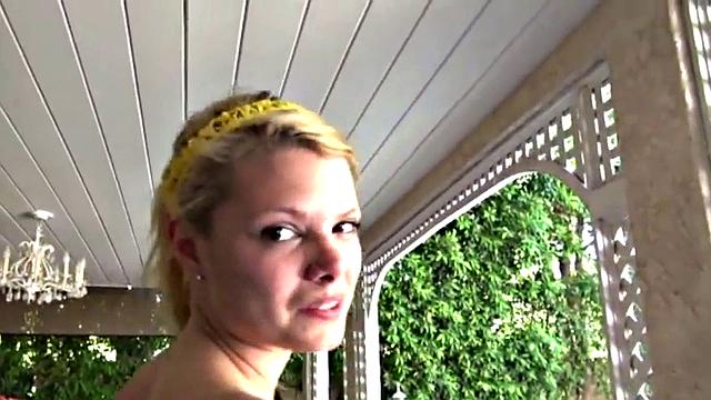 Cute blonde teen plays with her pussy solo