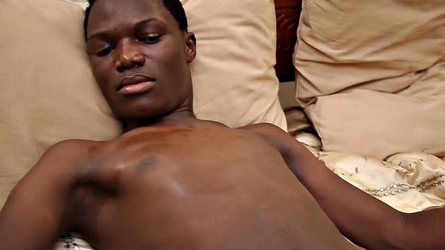 Solo Black twink from Africa jerks oiled cock at home
