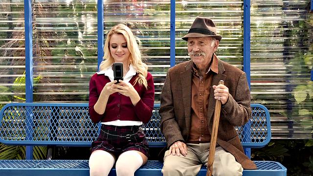 Biddie's long socks and sneakers will get her off in this hardcore cowgirl ride