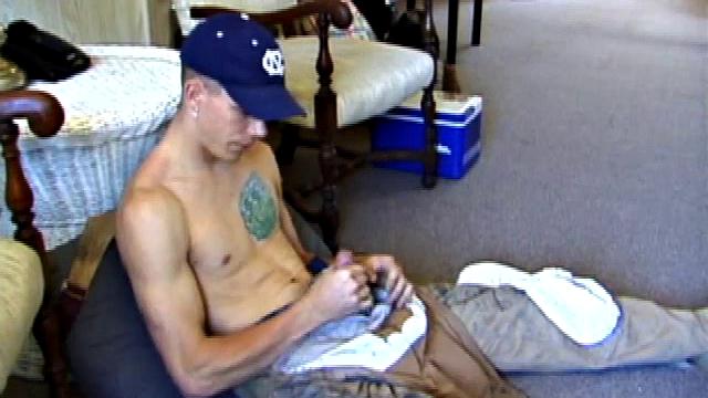 While on a break from doing yard work, Shane strips naked and starts getting stiff. He works the remote, and his cock, until finally pumping a messy cum load onto a towel.