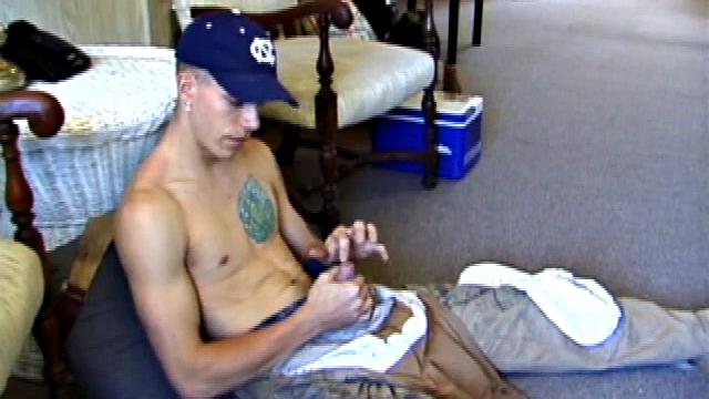 While on a break from doing yard work, Shane strips naked and starts getting stiff. He works the remote, and his cock, until finally pumping a messy cum load onto a towel.