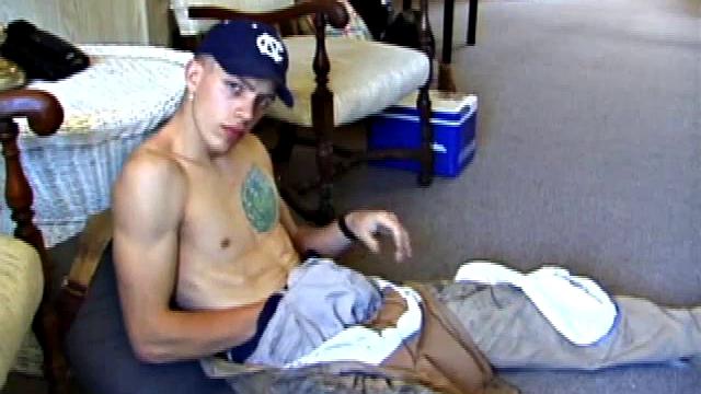 While on a break from doing yard work, Shane strips naked and starts getting stiff. He works the remote, and his cock, until finally pumping a messy cum load onto a towel.