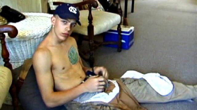 While on a break from doing yard work, Shane strips naked and starts getting stiff. He works the remote, and his cock, until finally pumping a messy cum load onto a towel.