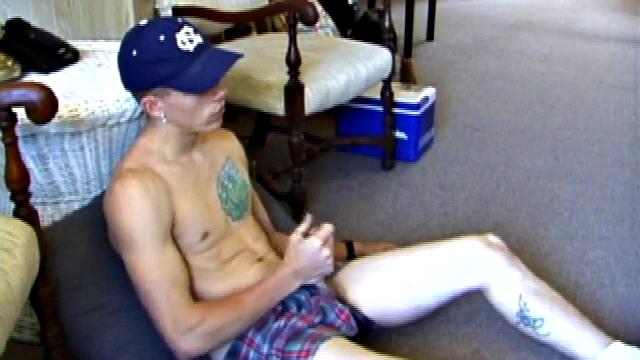 While on a break from doing yard work, Shane strips naked and starts getting stiff. He works the remote, and his cock, until finally pumping a messy cum load onto a towel.