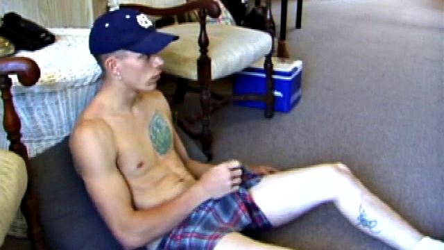 While on a break from doing yard work, Shane strips naked and starts getting stiff. He works the remote, and his cock, until finally pumping a messy cum load onto a towel.