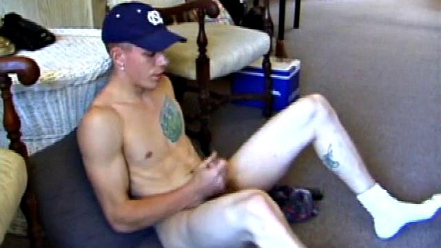 While on a break from doing yard work, Shane strips naked and starts getting stiff. He works the remote, and his cock, until finally pumping a messy cum load onto a towel.