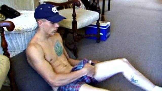 While on a break from doing yard work, Shane strips naked and starts getting stiff. He works the remote, and his cock, until finally pumping a messy cum load onto a towel.